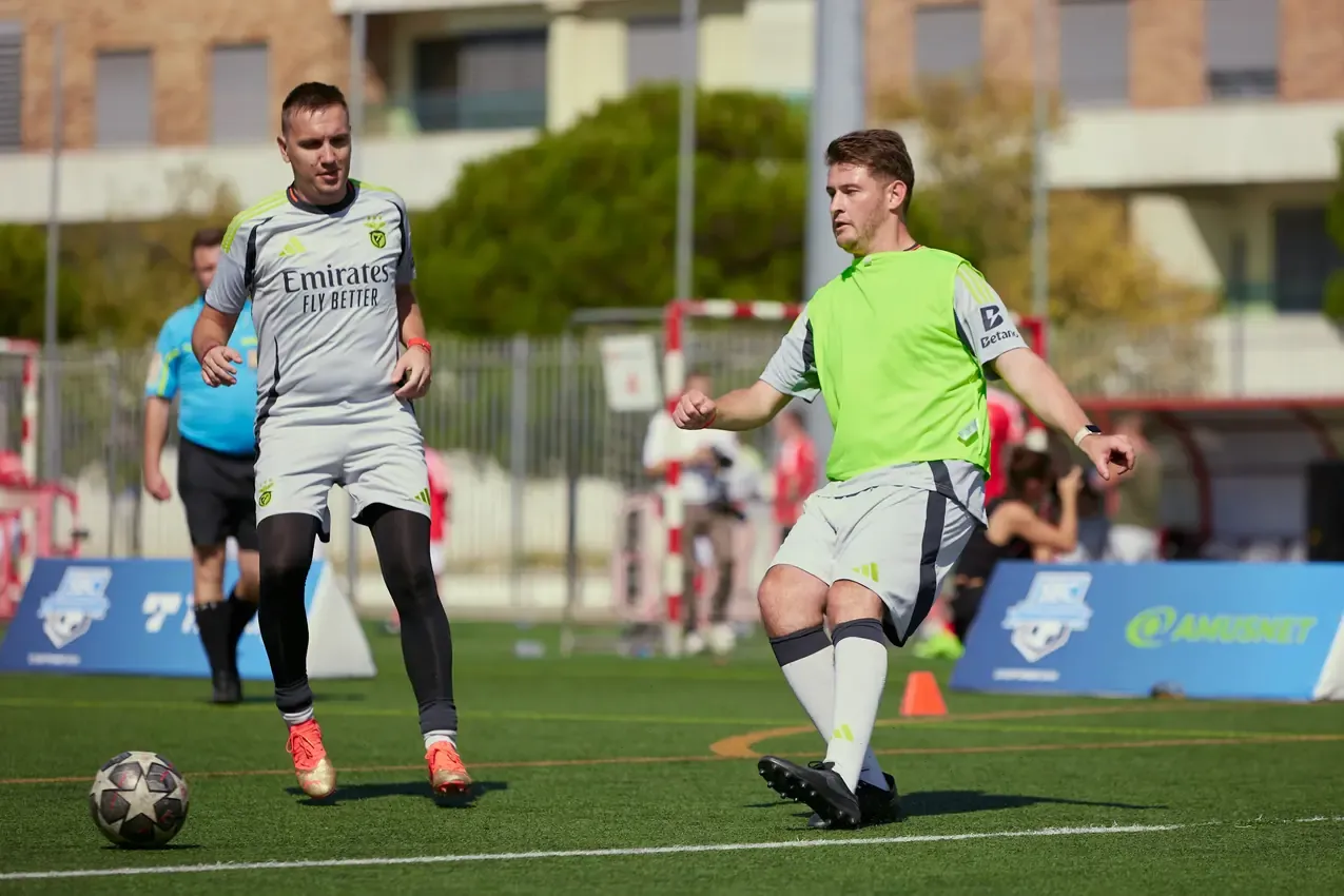 Two players facing off over the ball