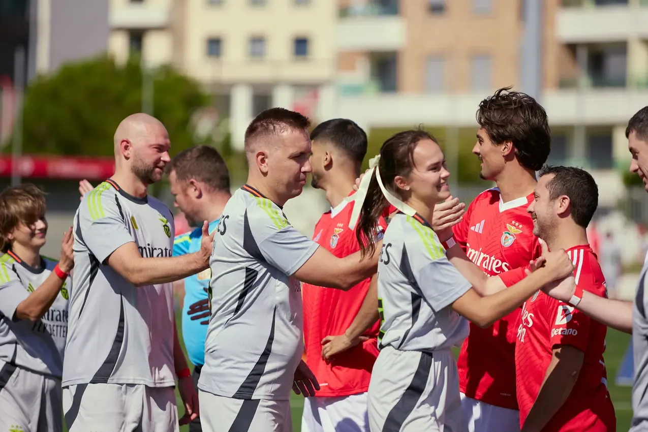 Players lining up and shaking hands before kick-off