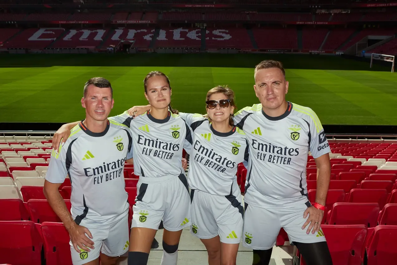 Four Betby players in the stands of Estádio da Luz