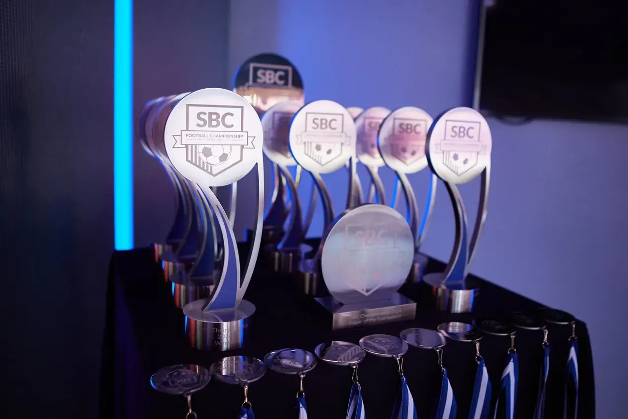 SBC Football Championship trophies on the awards table