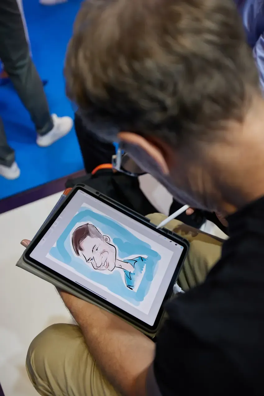 Finished caricature on a tablet at the Betby activation