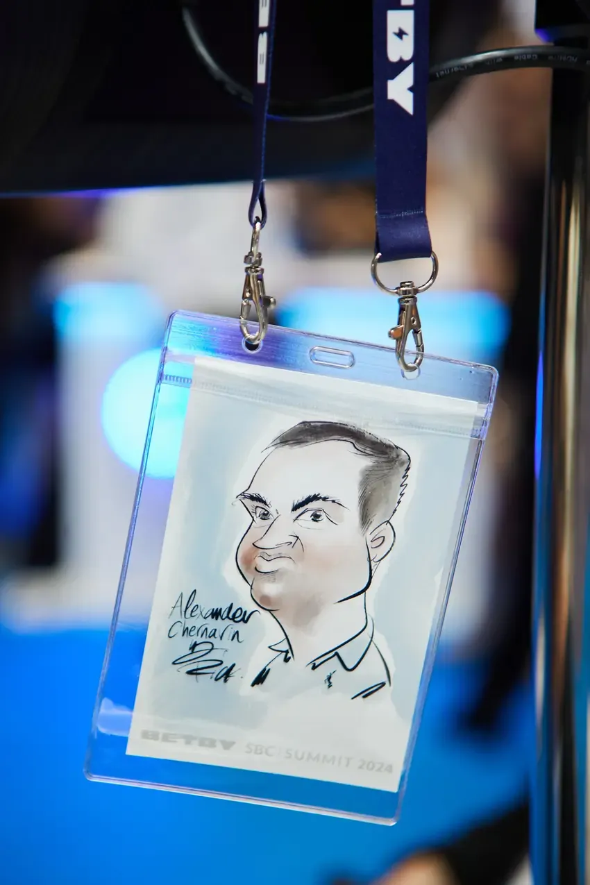 Caricature badge from the Betby activation at SBC Summit 2024