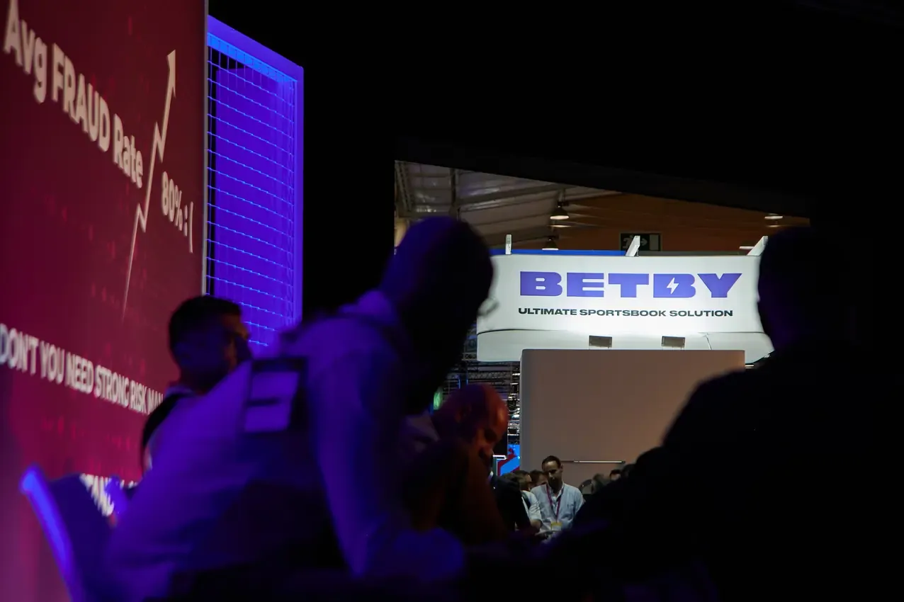 Betby banner inside the SBC Summit conference room