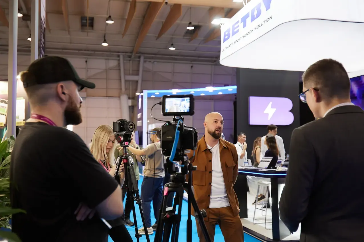 Interview being filmed at the Betby stand at SBC Summit 2024