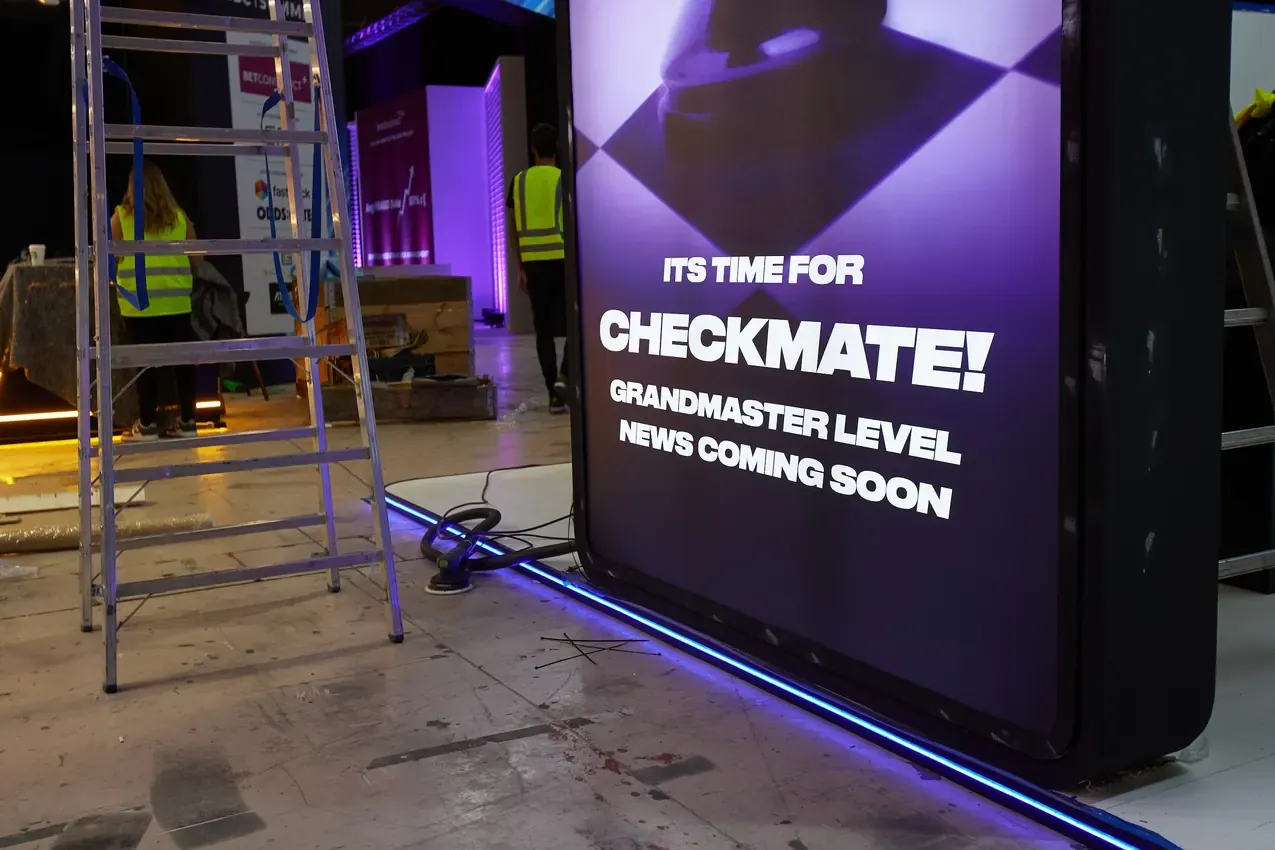 Betby teaser screen during the stand build at SBC Summit