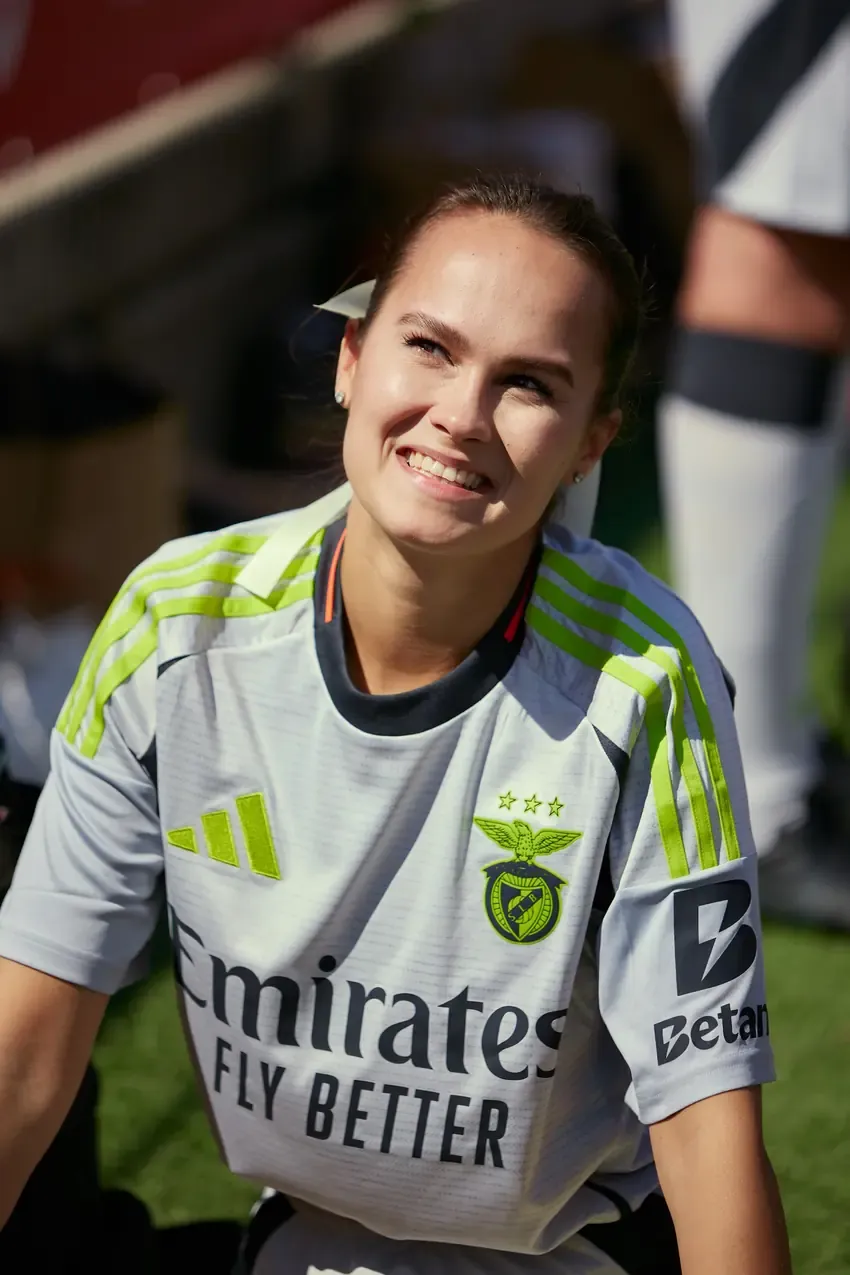 Betby player smiling on the pitch before the match